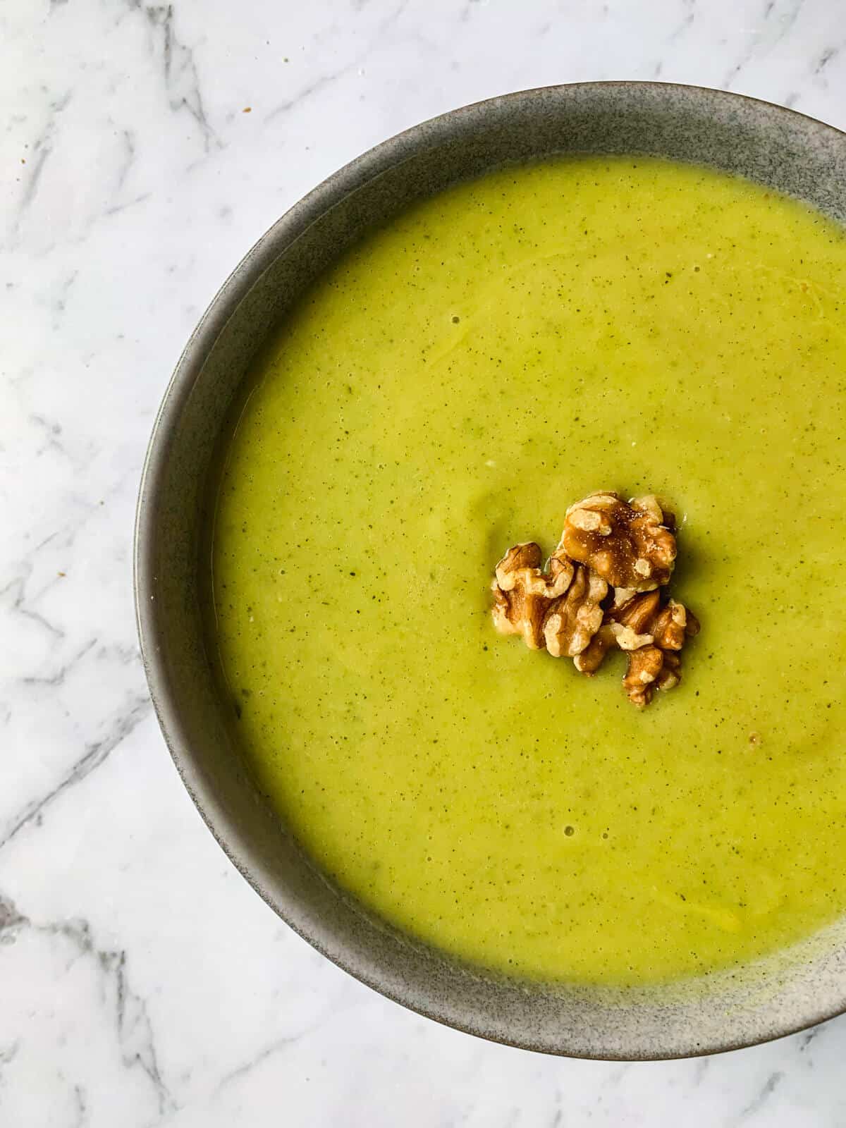 Zucchini Leek Soup with walnut garnish