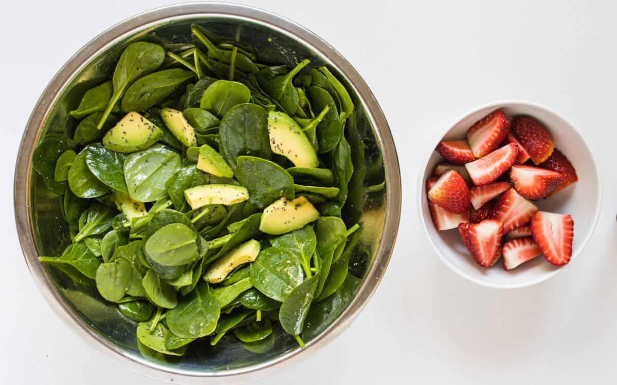 Strawberry Salad ingredients in a mixing bowl