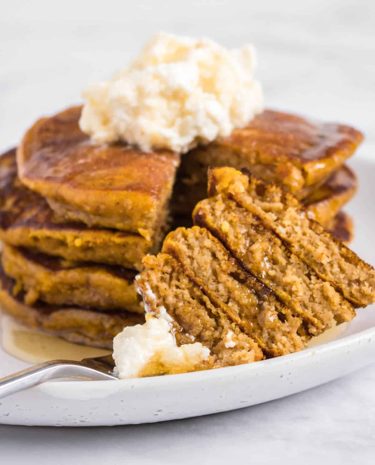 Pumpkin pancakes stack on a fork