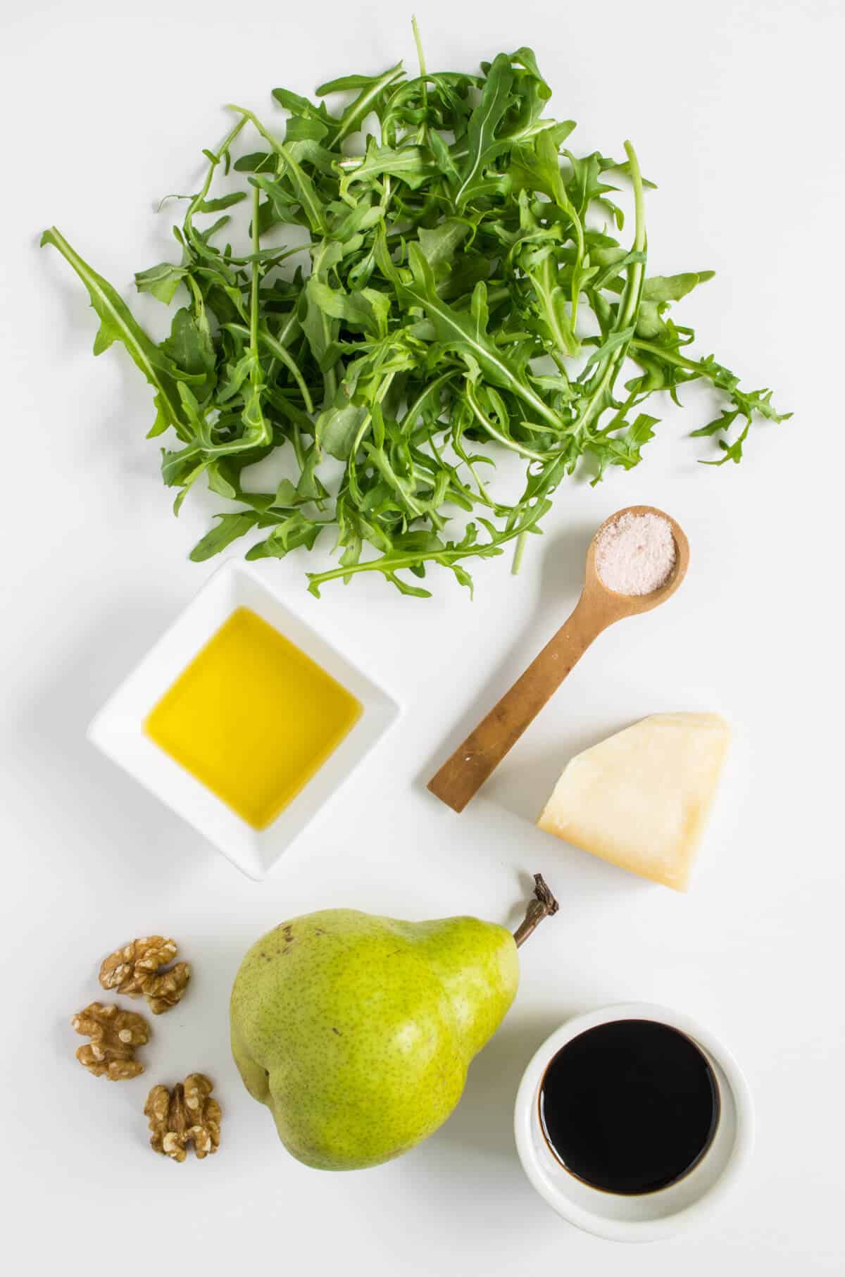Ingredients to make a rocket, pear and parmesan salad