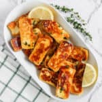 Honey Glaze Halloumi served on a plate with lemon