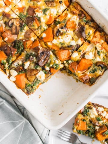 Vegetable Frittata in baking dish with one piece removed