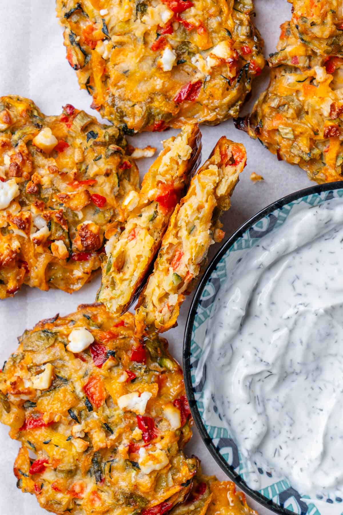 oven baked vegetable fritters served with a yoghurt sauce