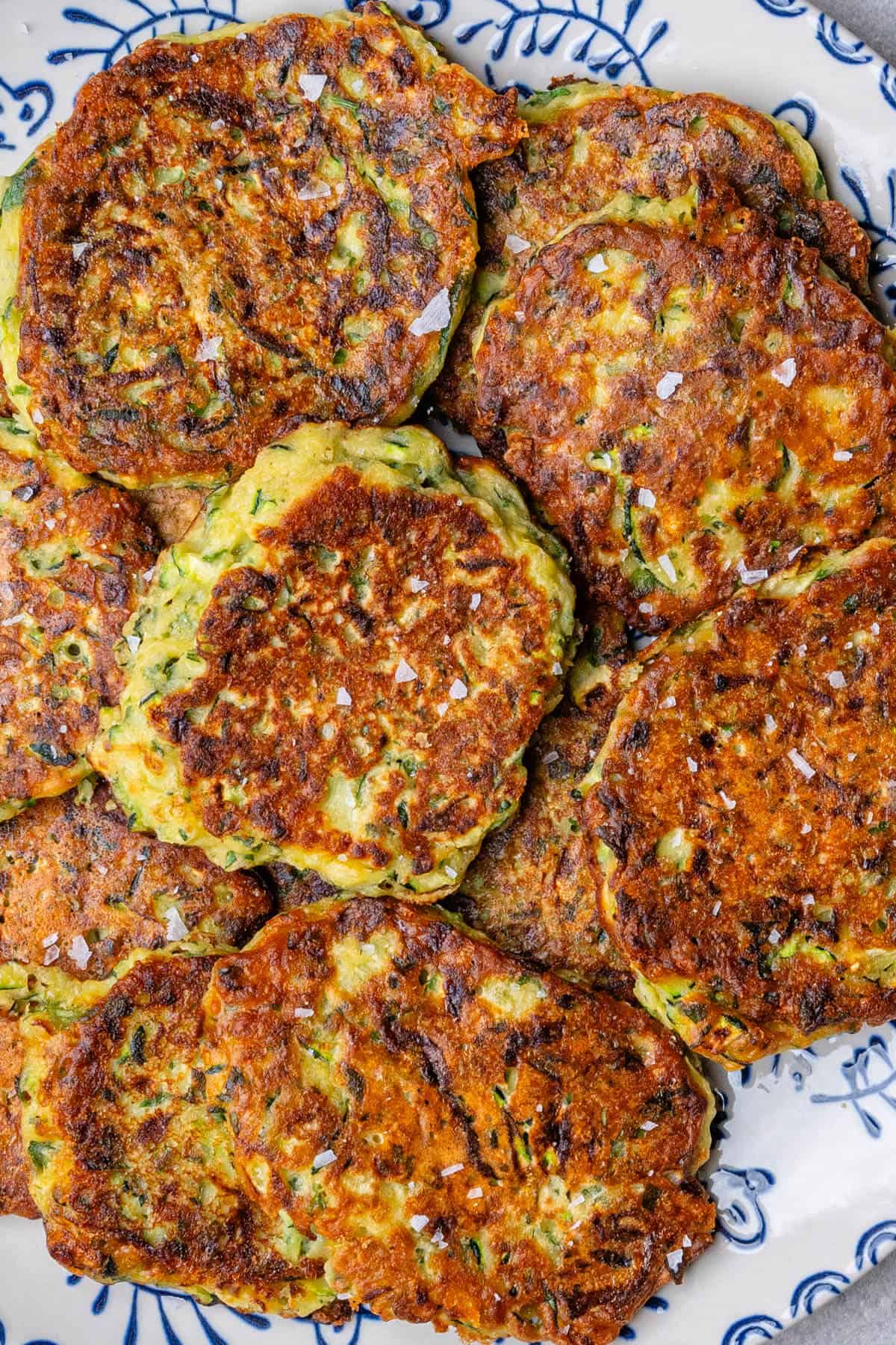 Plate of pan fried zucchini fritters