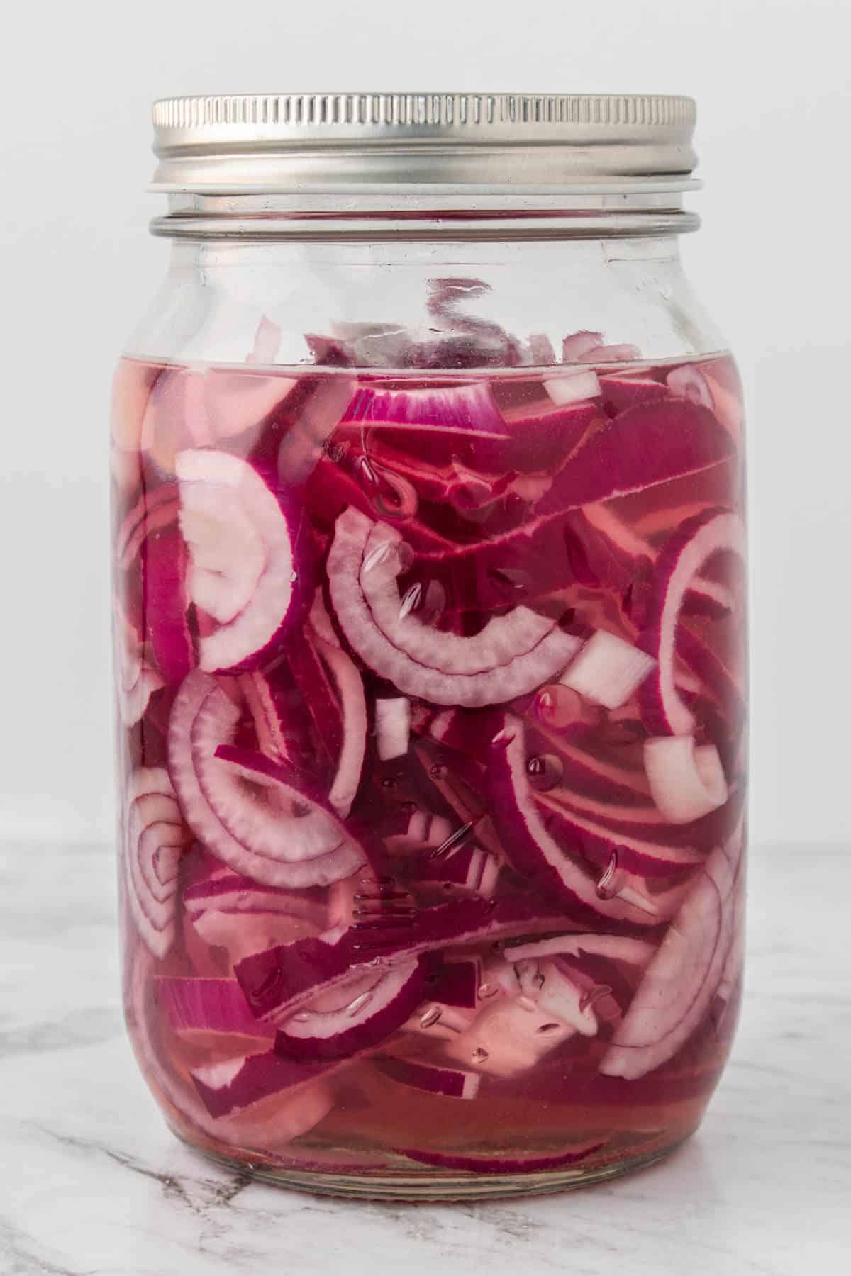 Quick Pickled Onions in a jar before going into the fridge