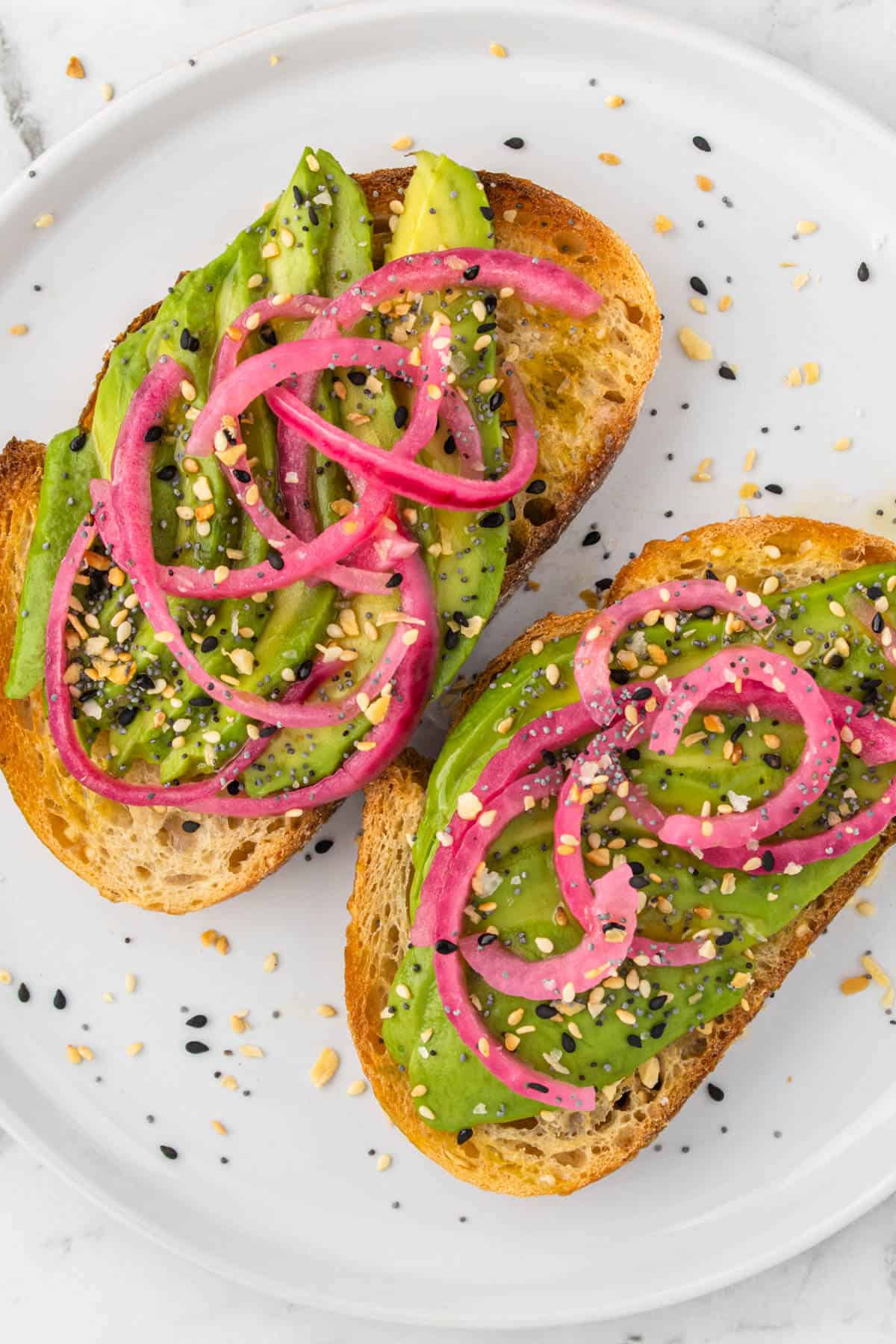Quick Pickled Onions with avocado and everything bagel seasoning on toast