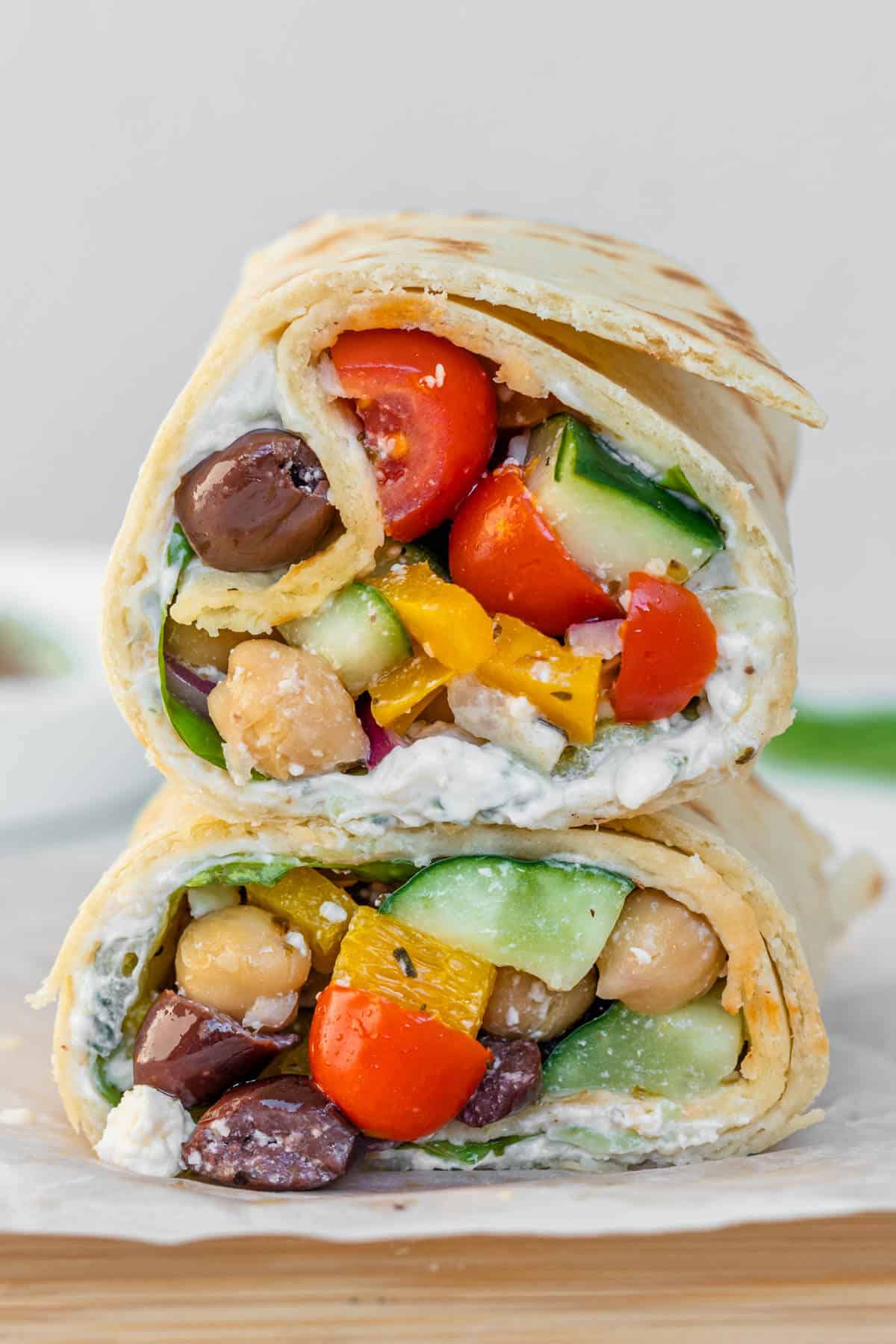 Greek Wrap with a greek salad mixture and chickpeas
