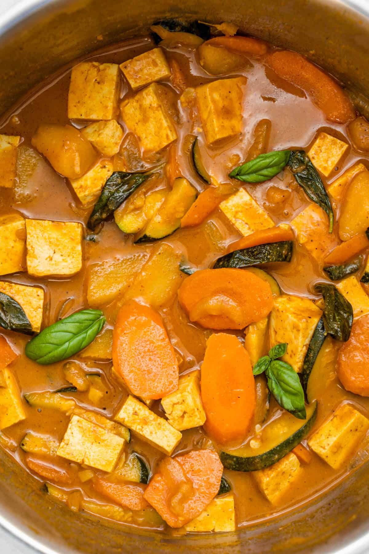 Close up of the inside of pot for thai yellow curry vegan