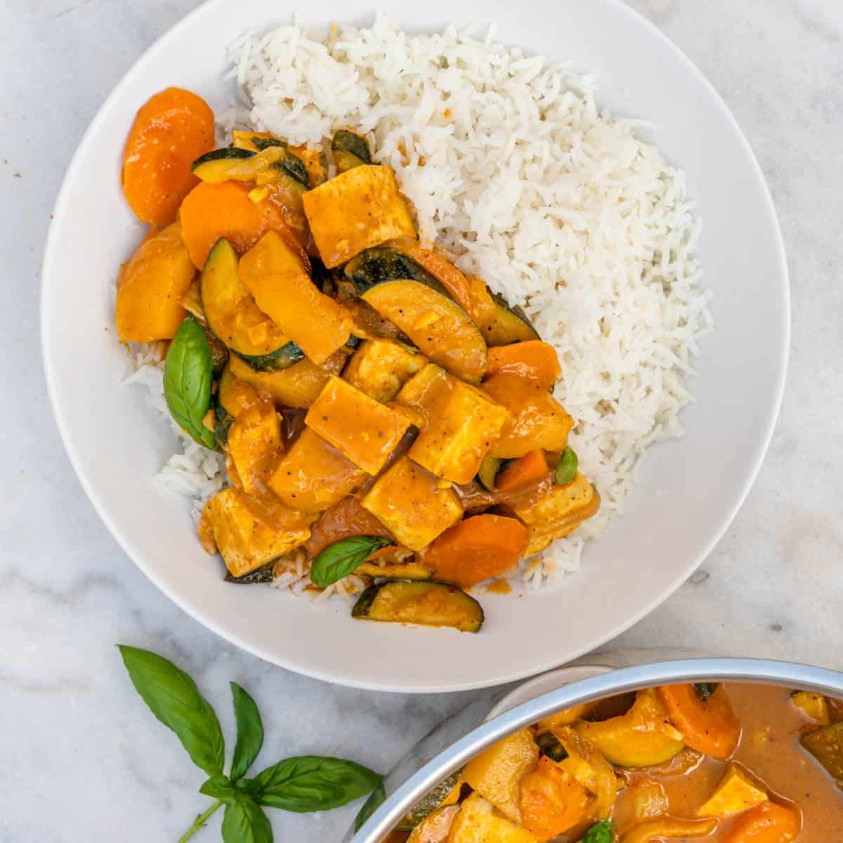 Thai yellow curry vegan served in a bowl with rice