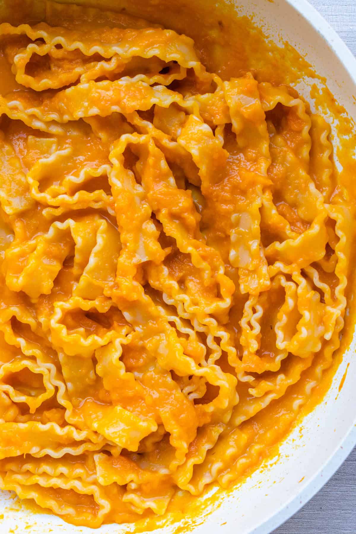 Creamy pumpkin pasta sauce in a pan