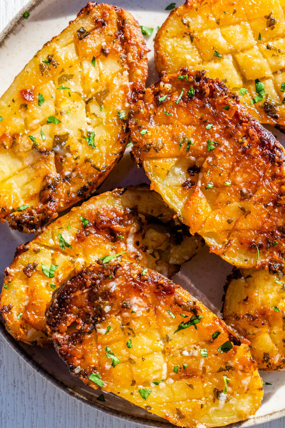 Parmesan crusted potatoes topped with fresh parsley