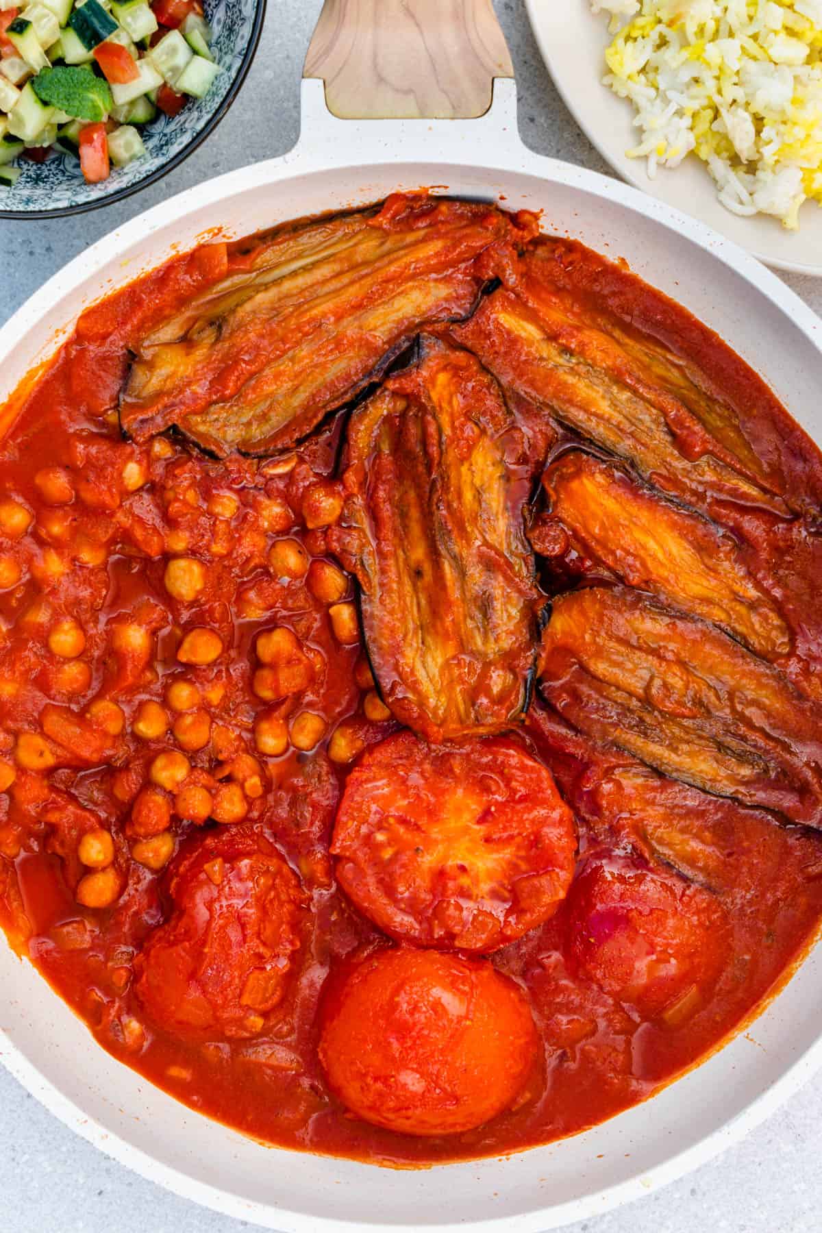 Khoresh Bademjan Vegan Persian eggplant stew with Persian rice and Shirazi salad on the side