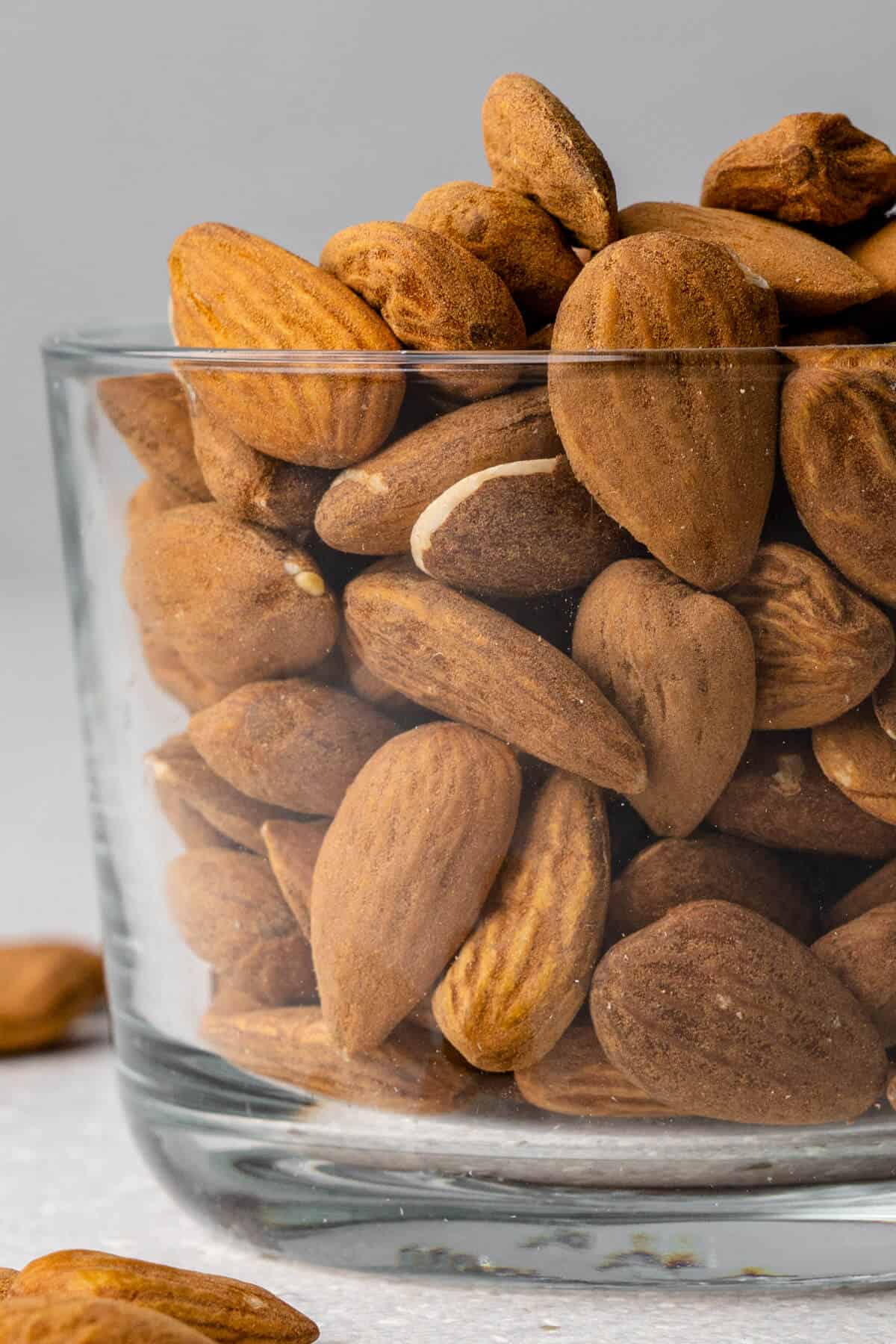 Raw almonds in a glass