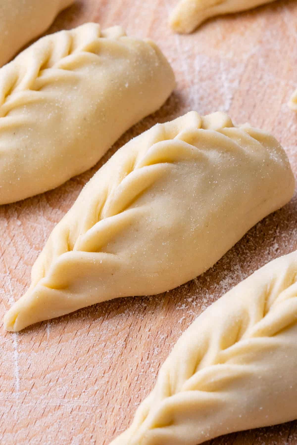 Close up of a culugiones to show the folds, before being cooked