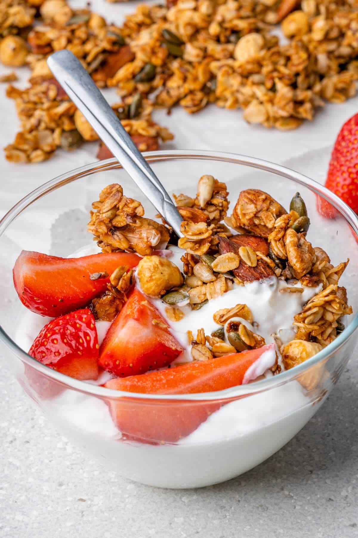 Healthy yogurt bowl with strawberries and homemade granola