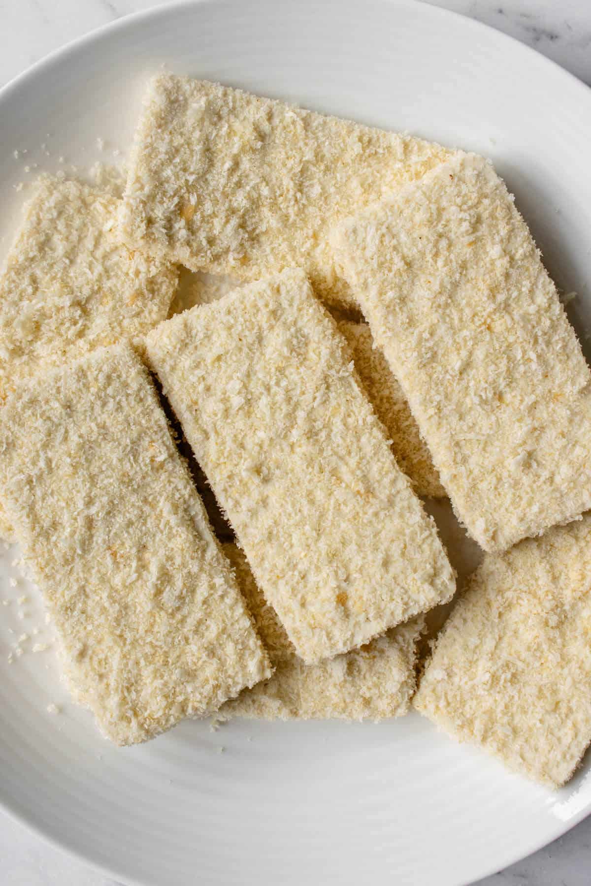 Panko breadcrumb tofu pieces before being cooked