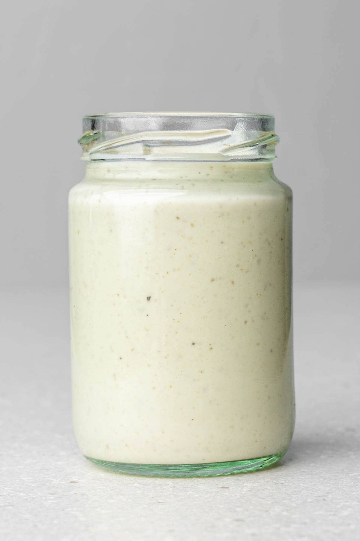 Close up of healthy caesar dressing in a jar