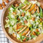 Healthy Caesar Salad served in a big wooden bowl