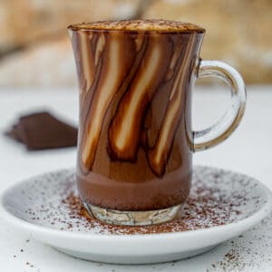Marocchino Coffee with espresso, foamy milk and chocolate then dusted with cacao
