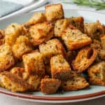 Tower of air fryer croutons on a plate