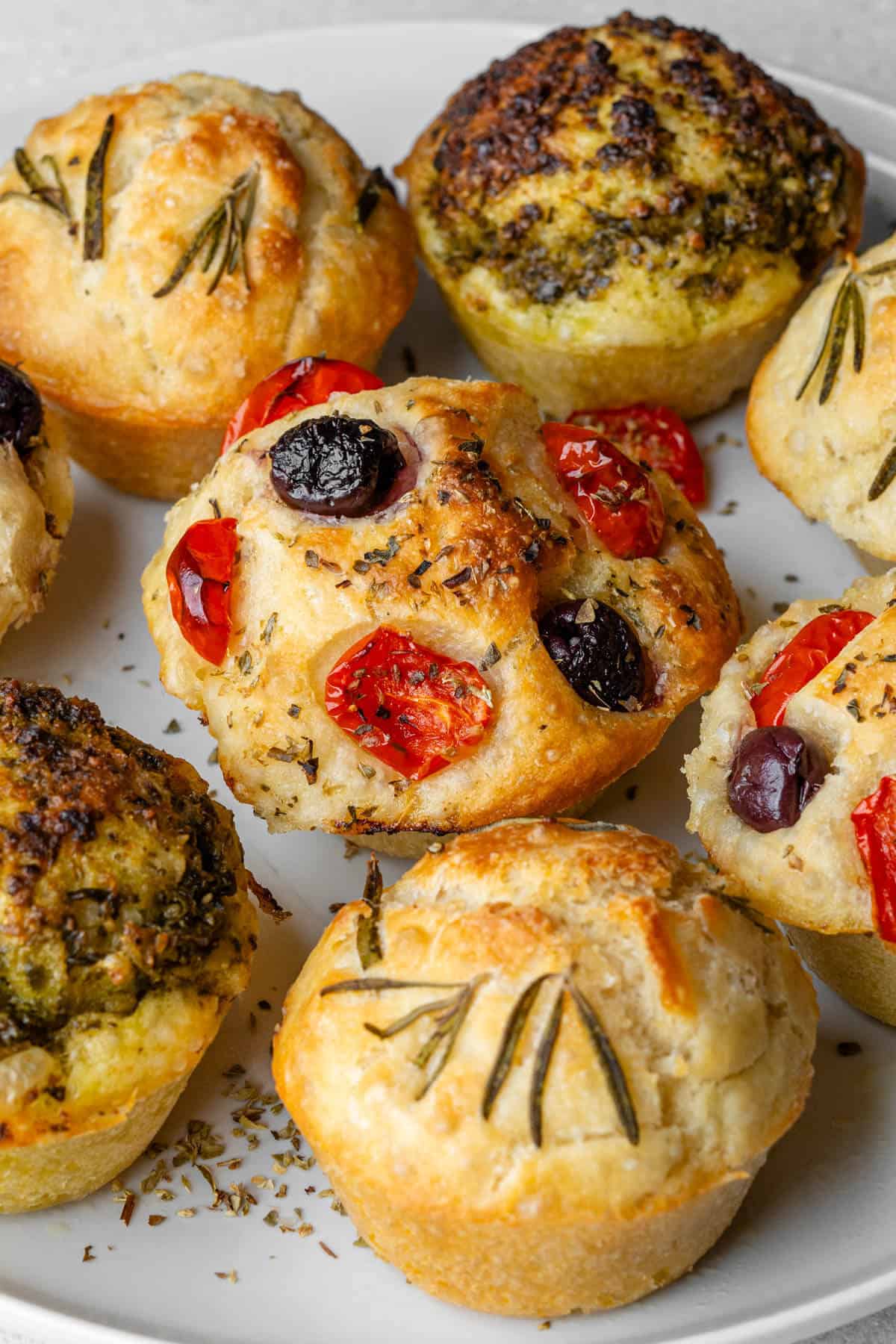 3 flavors of focaccia muffins served on a plate