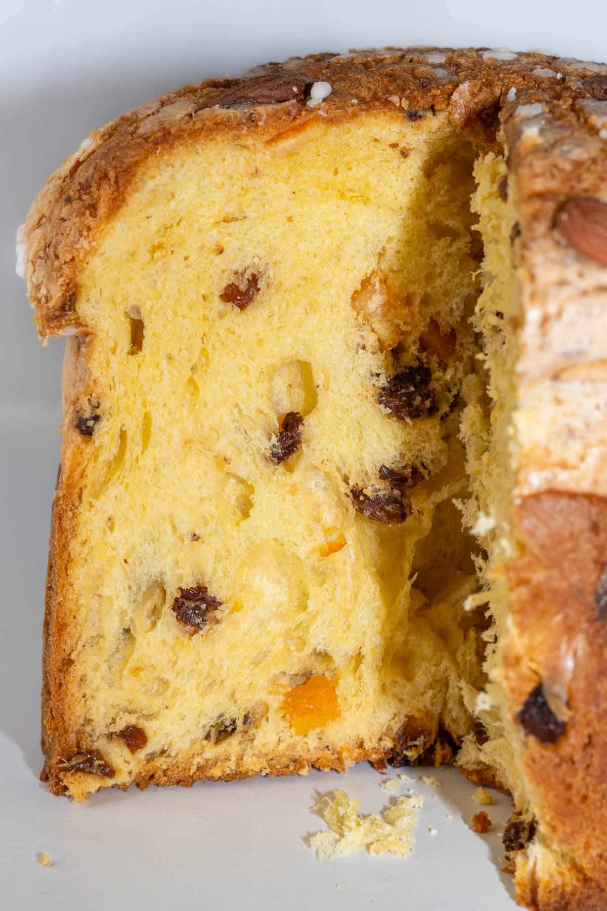 Inside look of a panettone with a piece missing