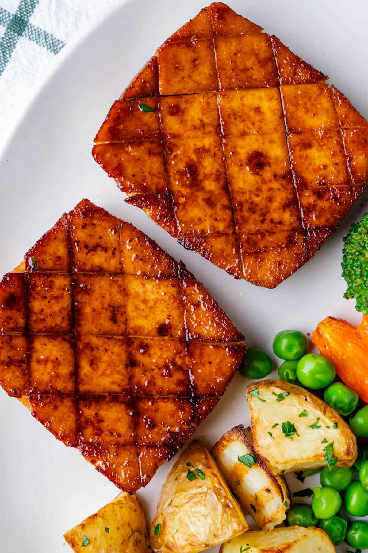 Tofu steak served with vegetables