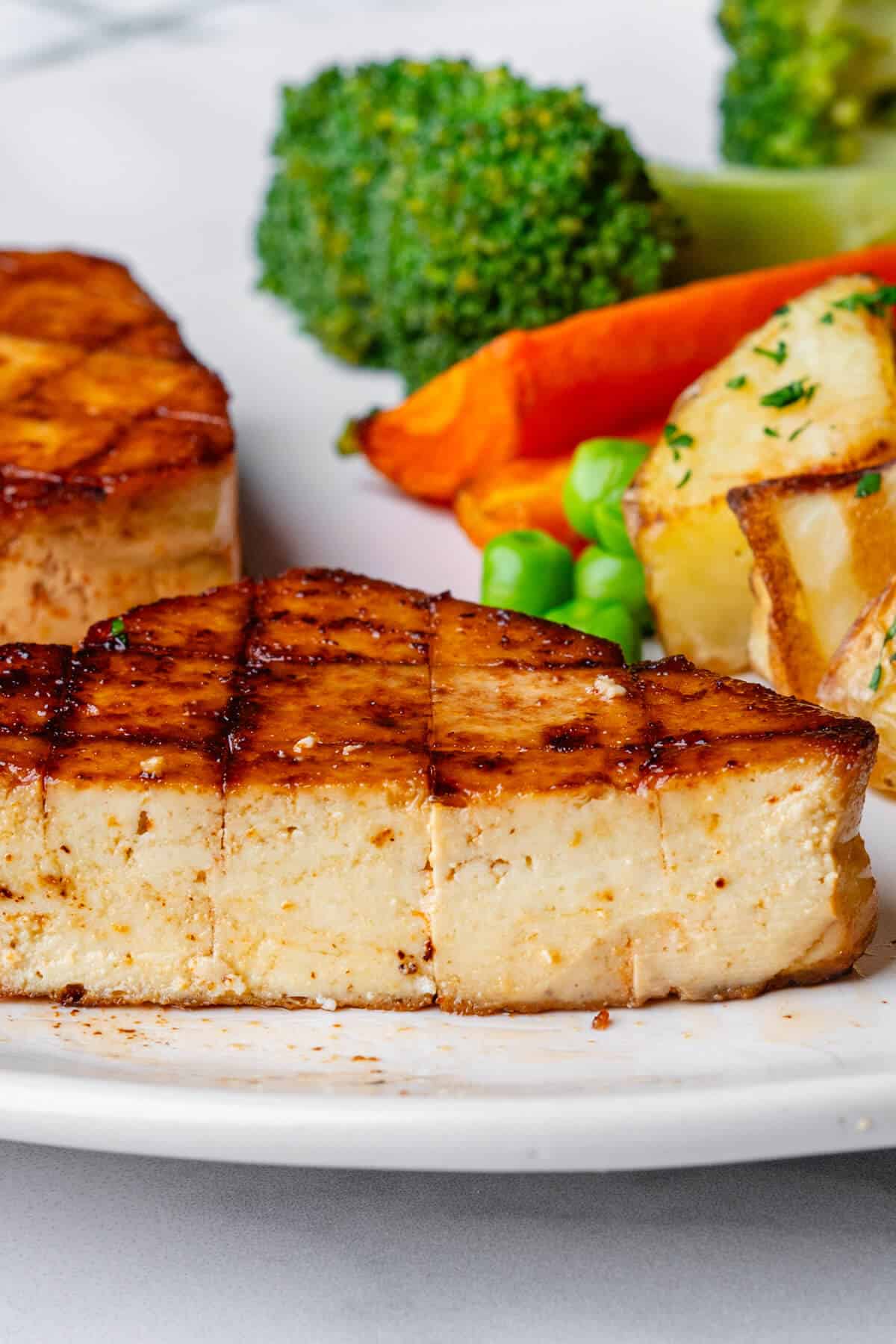 Tofu steak sliced to show the inside