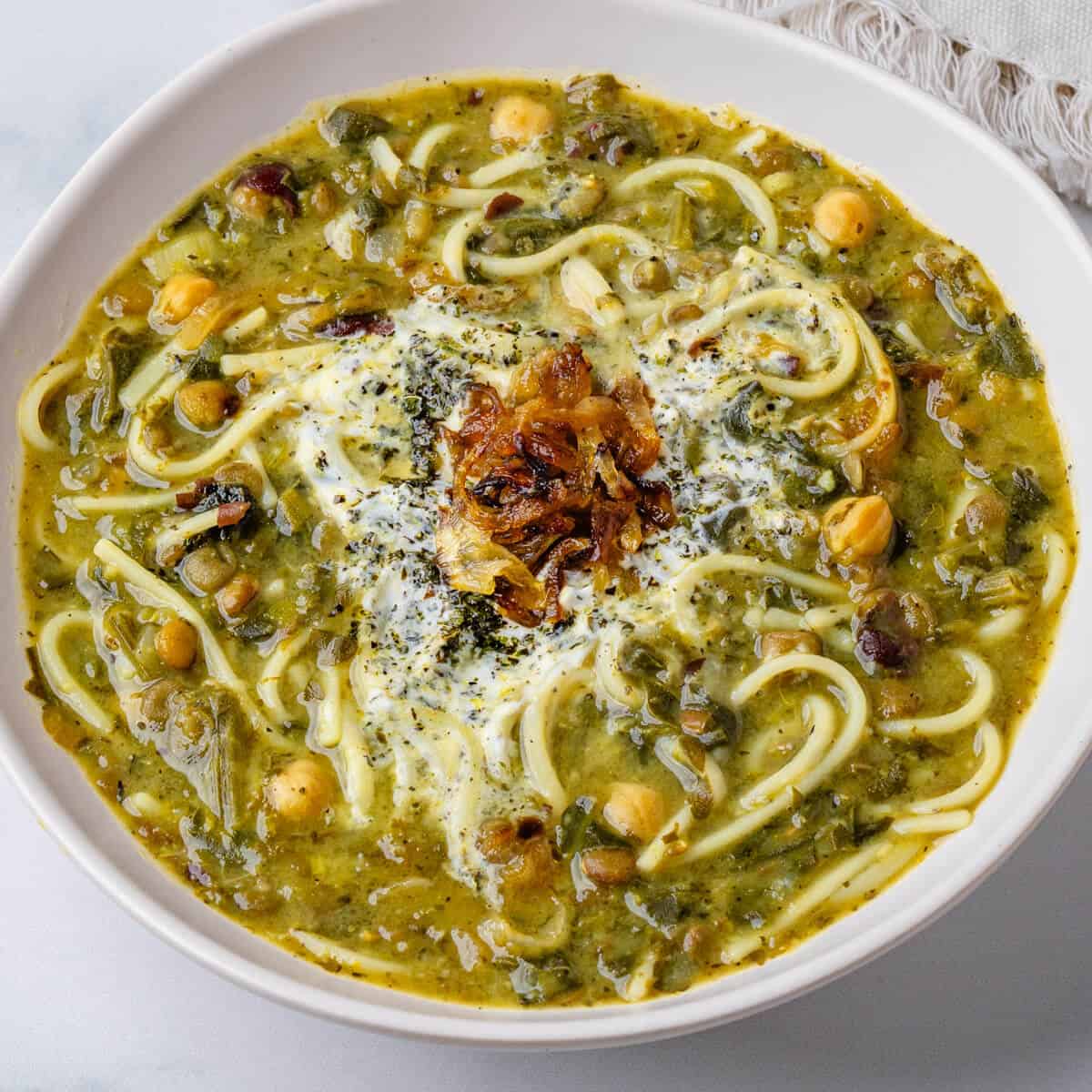 Ash Reshteh Persian Noodle Soup in a bowl