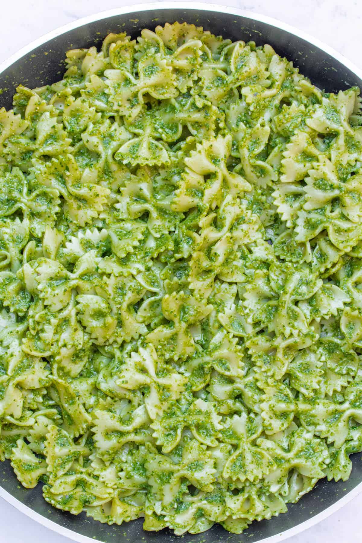 Green pasta in a pan