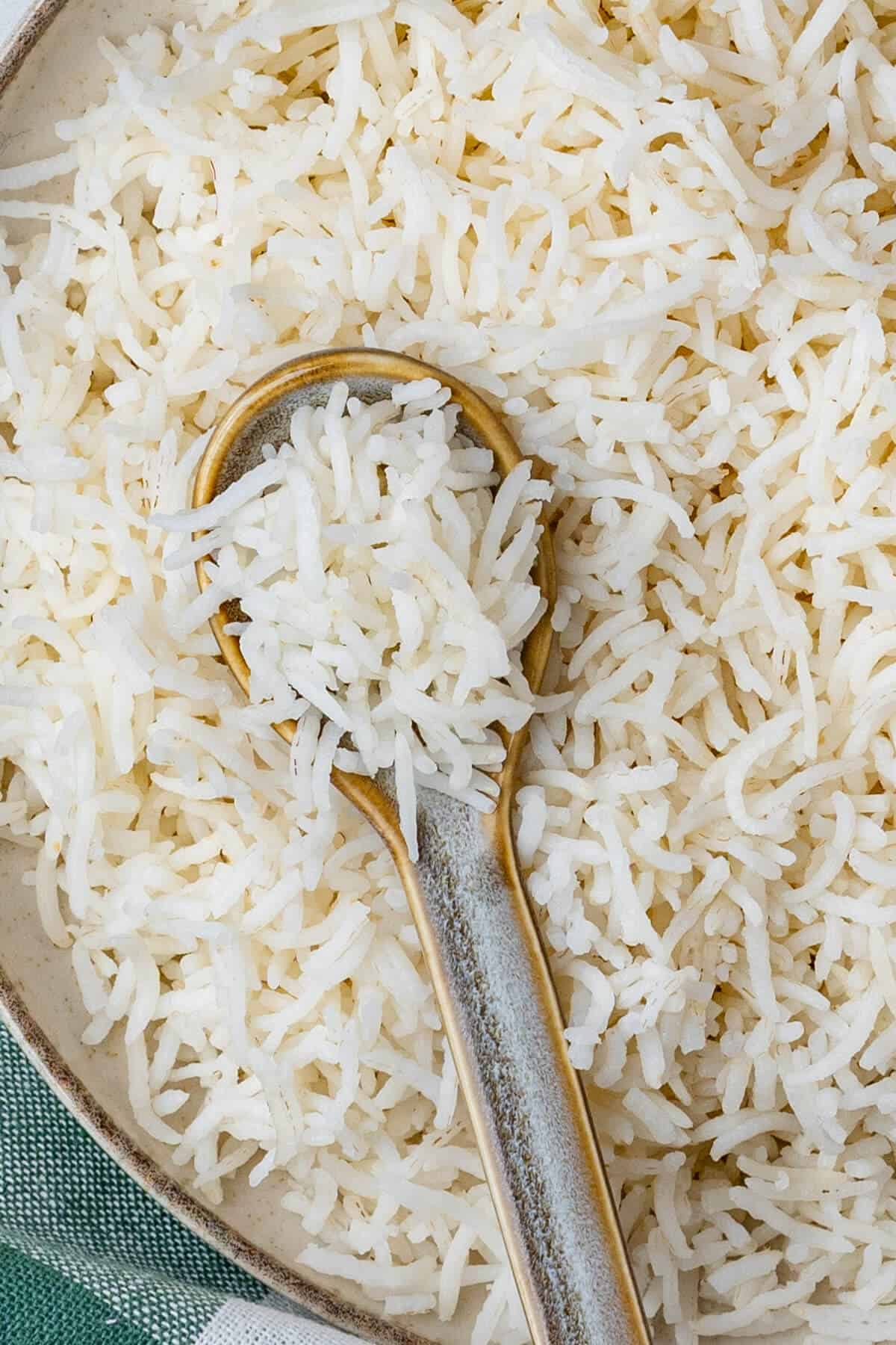 Spoon in a bowl of basmati rice