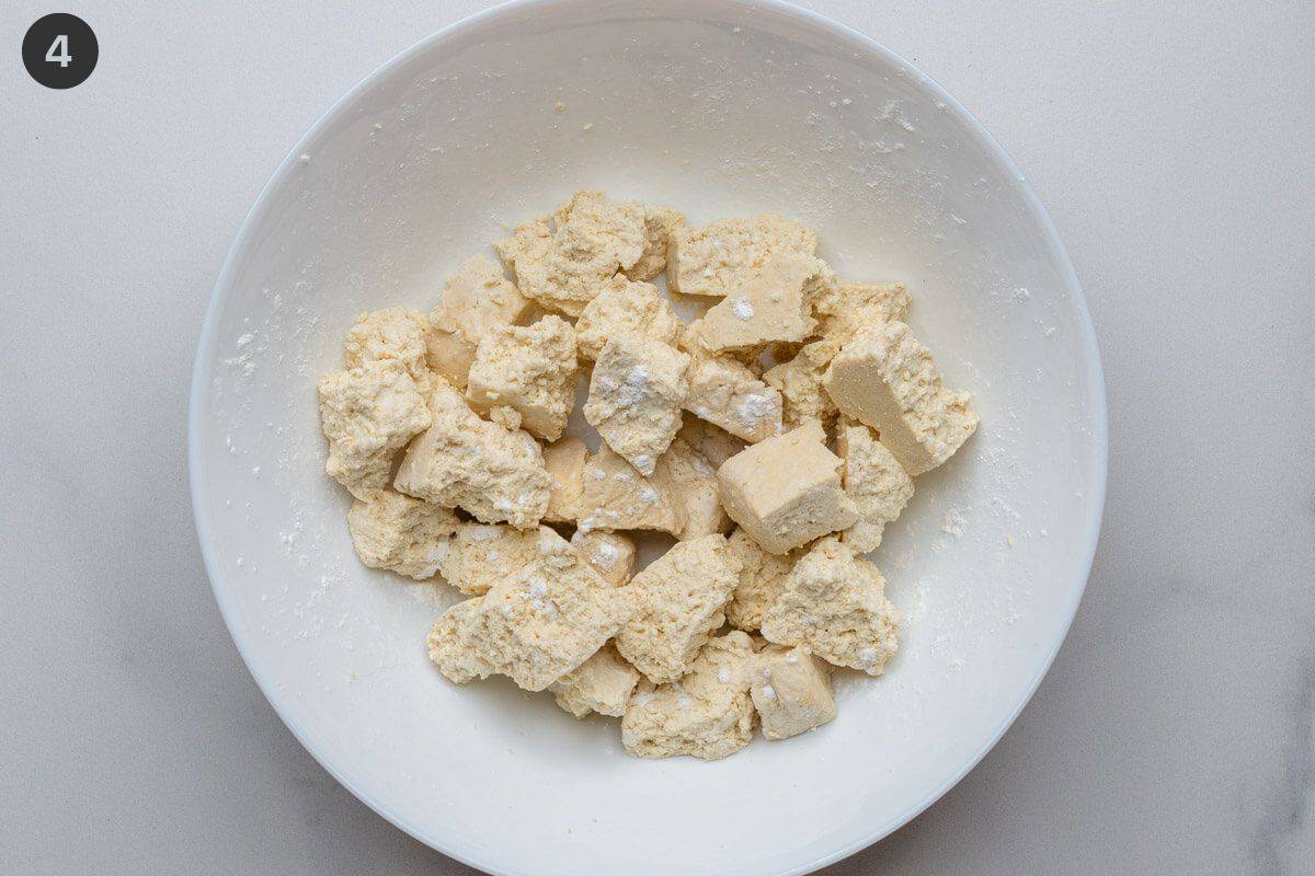 Tofu pieces coated in cornstarch
