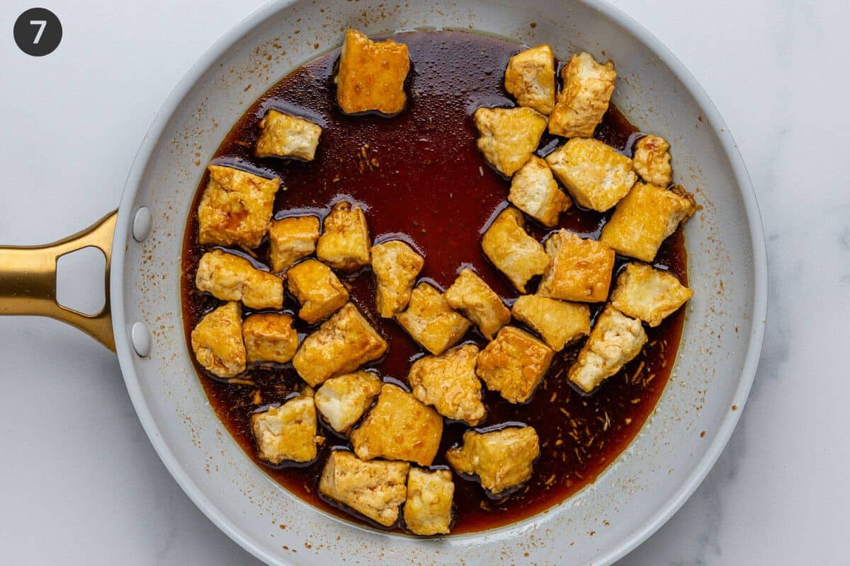 Tofu added in pan with teriyaki sauce