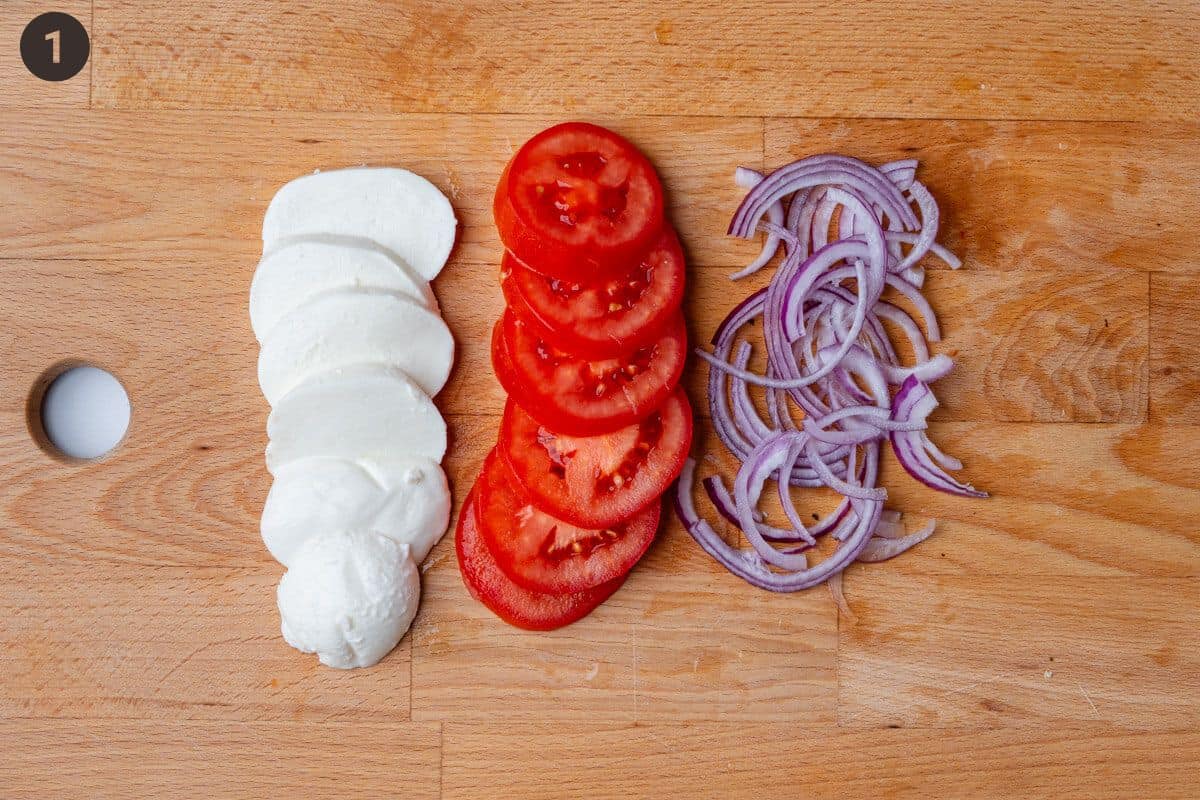 Cut mozzarella, tomato and red onion