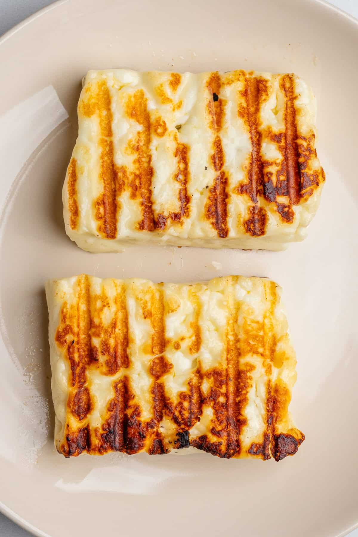 Two pieces of halloumi grilled