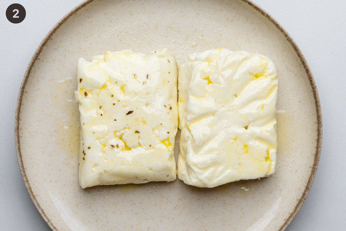 Halloumi pieces covered in olive oil