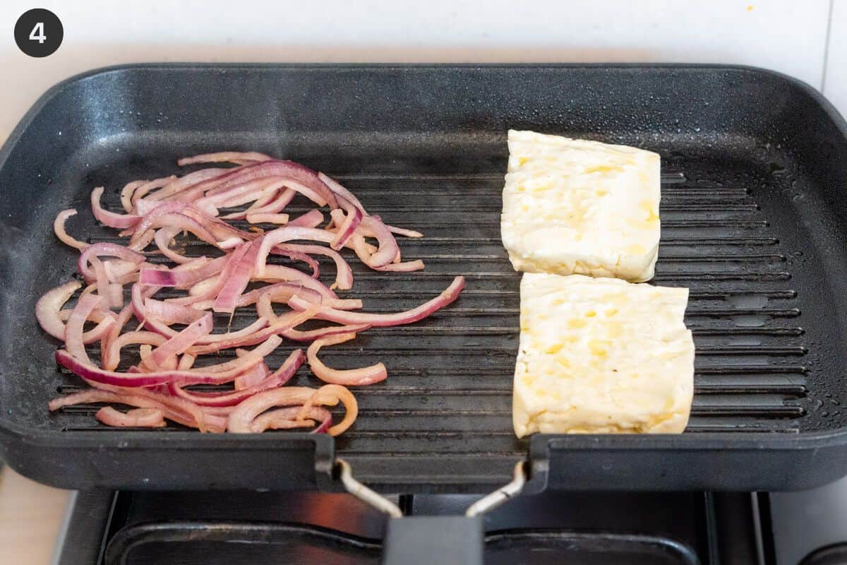halloumi and red onions being grilled