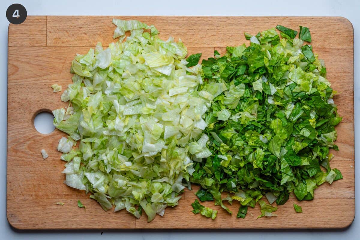 Chopped lettuce on a cutting board