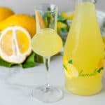 Limoncello recipe with a glass full and a bottle on the side