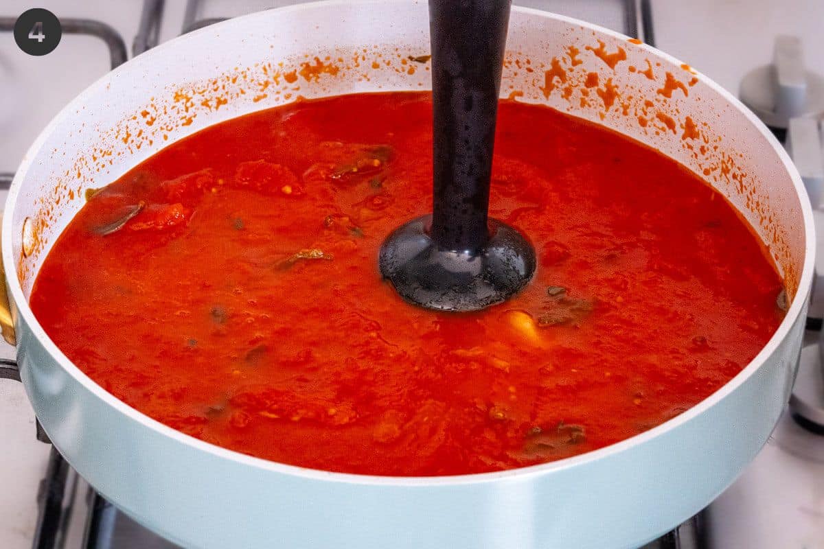 Immersion blended, blending tomato sauce