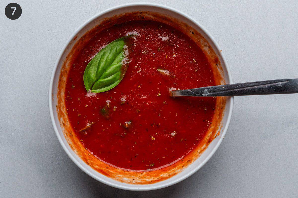 Tomato sauce being made in a bowl