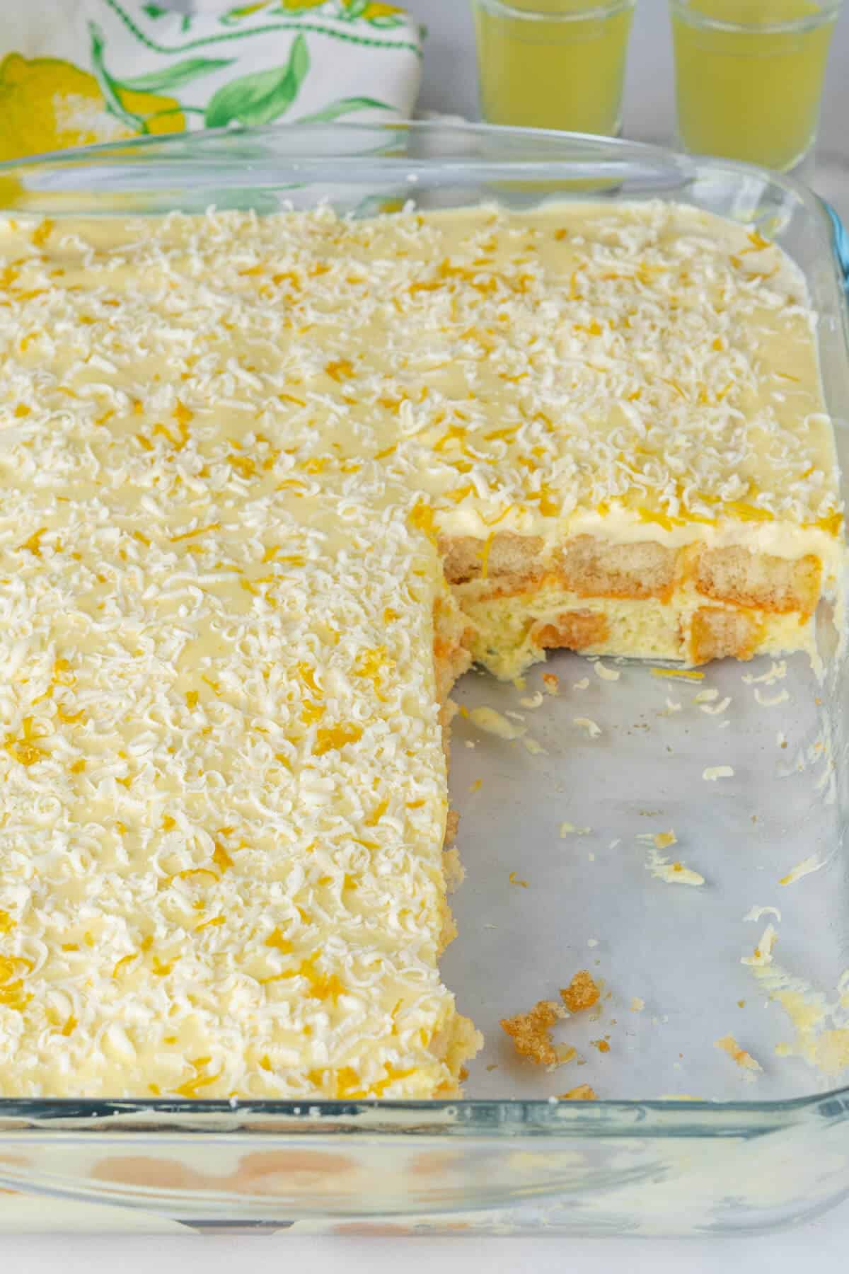 Tray of limoncello tiramisu with pieces missing