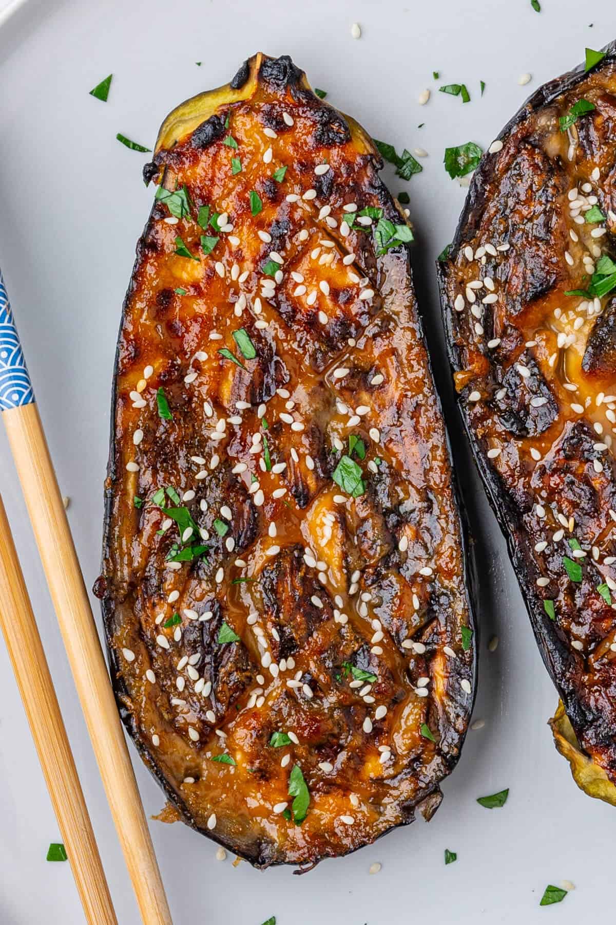 Close up of one piece of miso eggplant with sesame seeds
