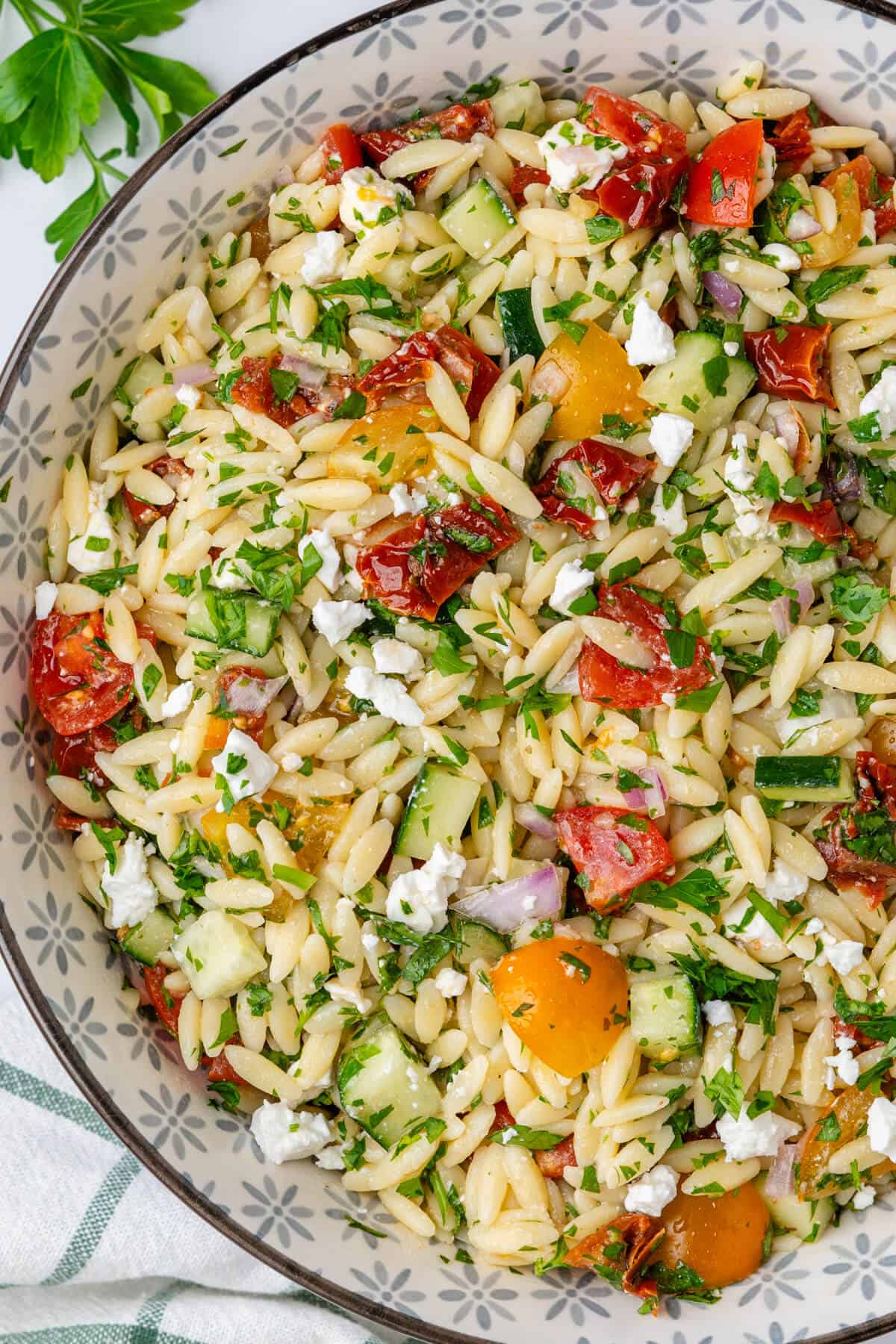 Orzo pasta salad served in a bowl