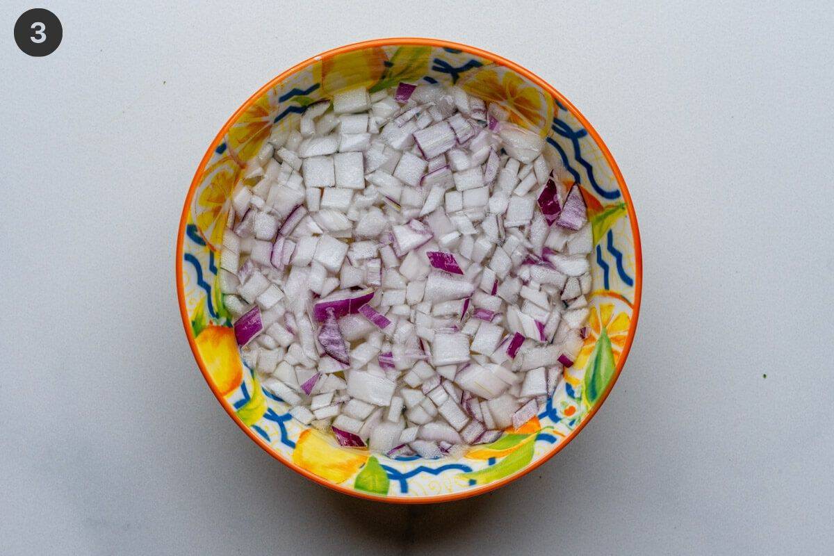 Chopped onions soaked in a bowl of water