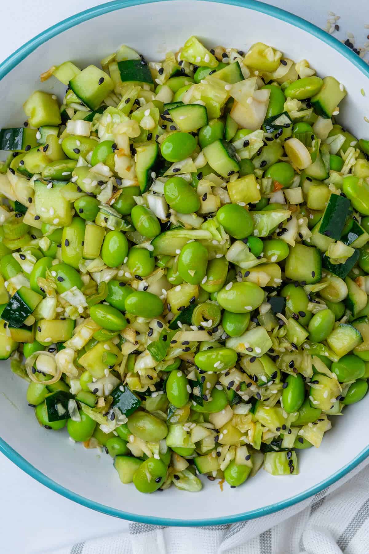 Bowl of final edamame salad with sesame seeds