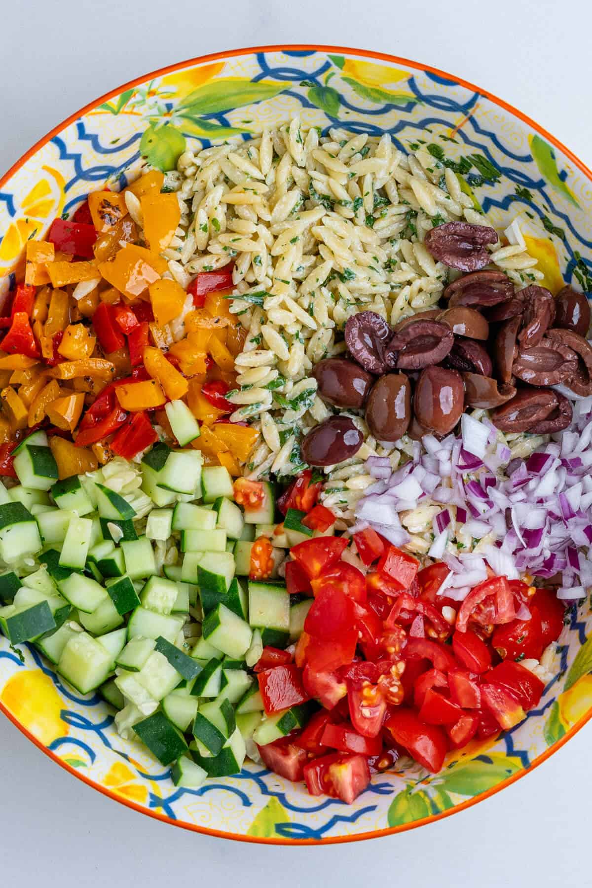 Salad ingredients in a bowl before being mixed