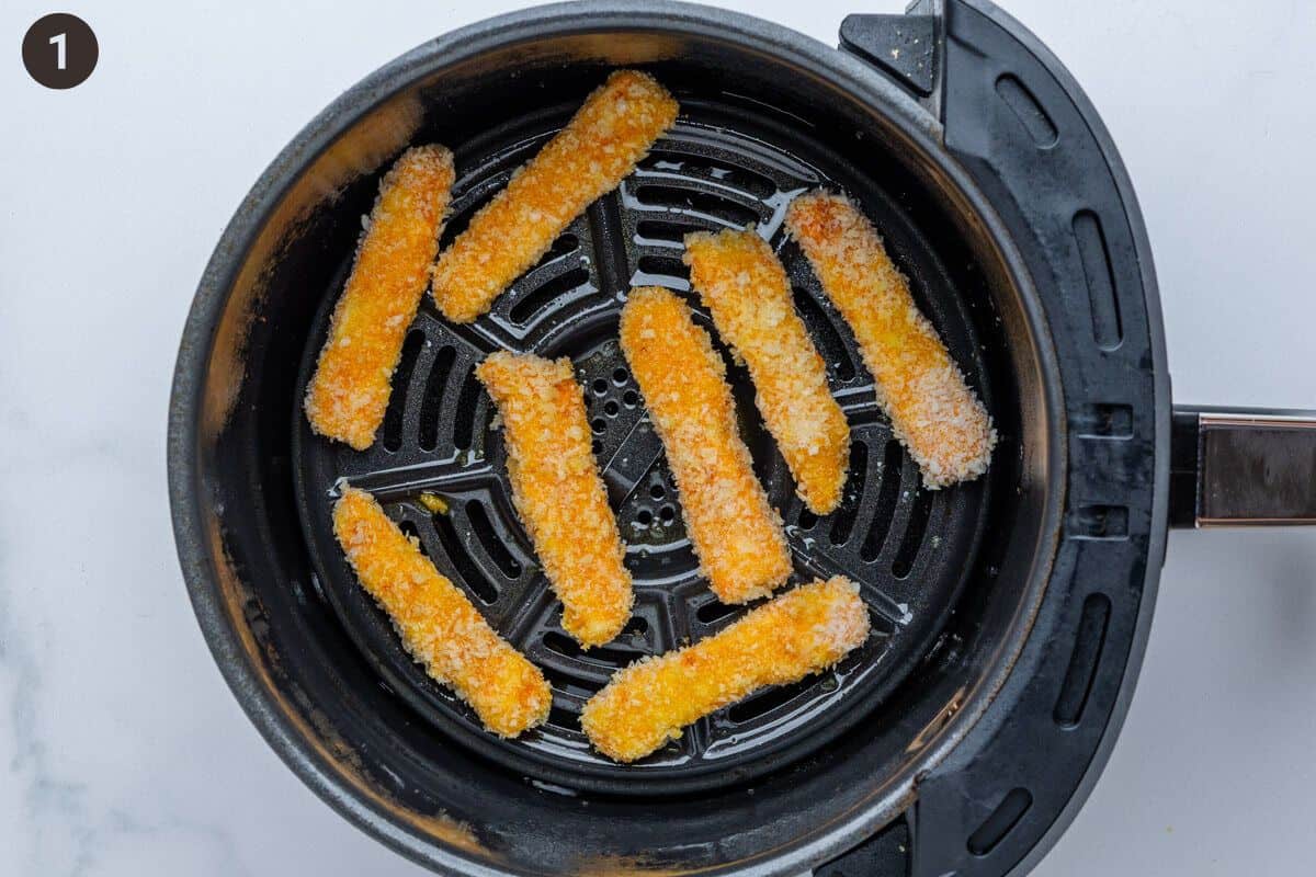 Fries placed into an air fryer