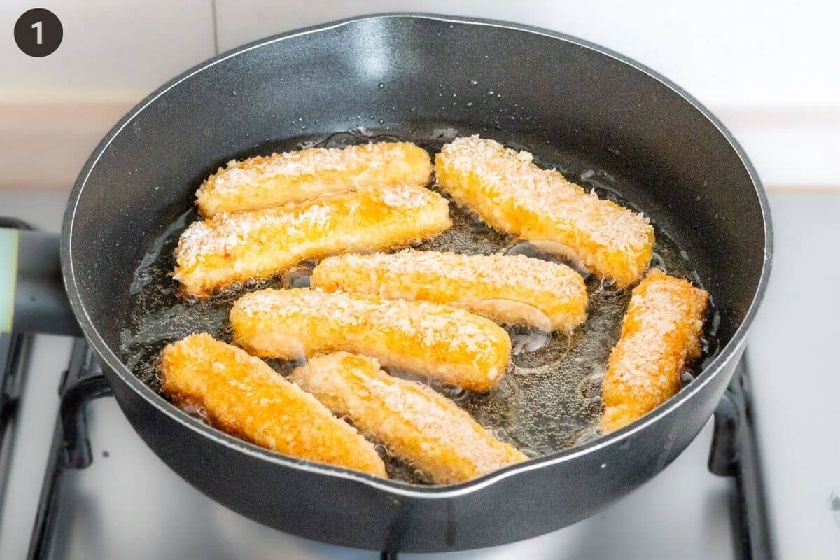Fries being pan fried in oil