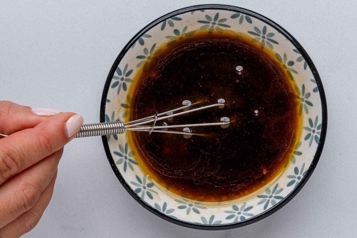 Whisk in a small bowl of dressing